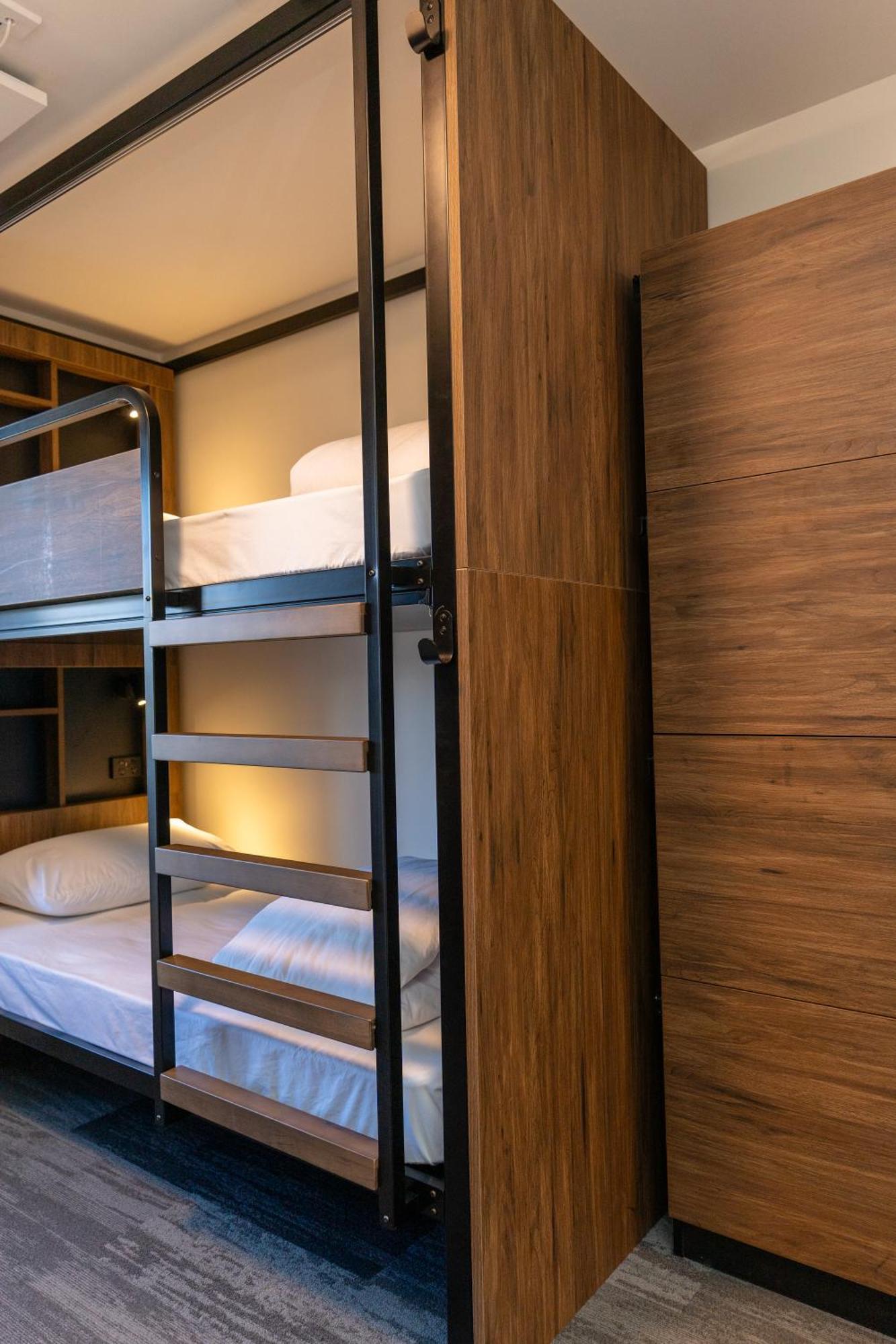 Haka House Rotorua Hostel Exterior photo A bunk bed in a capsule hotel
