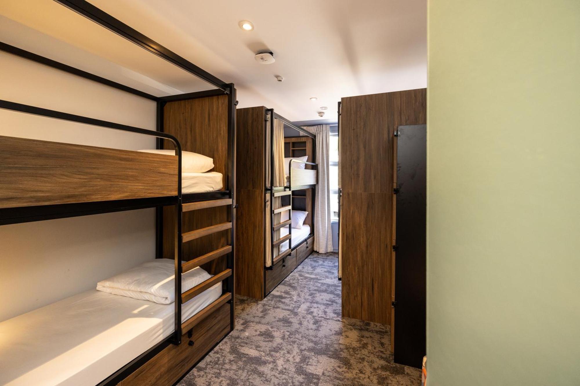 Haka House Rotorua Hostel Exterior photo A typical room at a capsule hotel